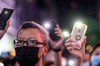 The Impact of Government-Assisted Phone and Internet Programs
