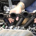 What are the main benefits of installing long tube headers?