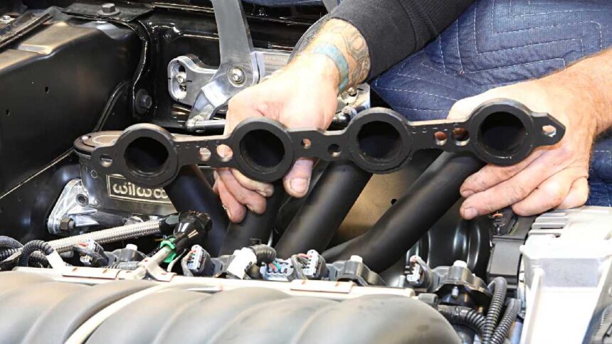 What are the main benefits of installing long tube headers?